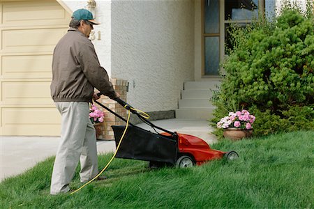 Man Mowing the Lawn, Calgary, Alberta, Canada Stock Photo - Rights-Managed, Code: 700-00523651