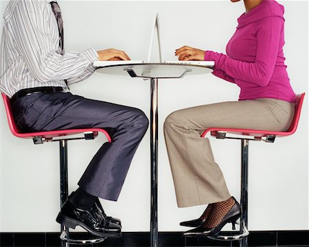 Two Business People using Laptops Stock Photo - Rights-Managed, Code: 700-00523777