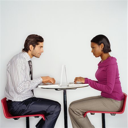 Man and Woman Using Laptop Computers Stock Photo - Rights-Managed, Code: 700-00523781