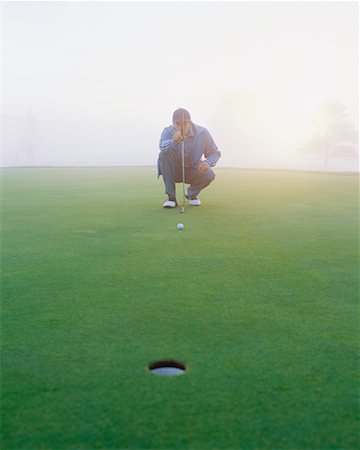 simsearch:6113-07159316,k - Golfer on Putting Green Stock Photo - Rights-Managed, Code: 700-00523811