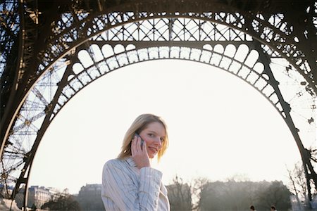 simsearch:700-00189516,k - Woman on Cell Phone in Front of Eiffel Tower, Paris, France Stock Photo - Rights-Managed, Code: 700-00530195