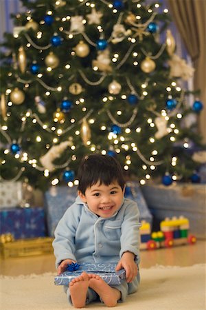 Boy with Gift on Christmas Morning Stock Photo - Rights-Managed, Code: 700-00544364