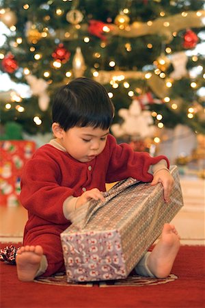 simsearch:700-00547217,k - Boy Opening Gift on Christmas Morning Stock Photo - Rights-Managed, Code: 700-00544362