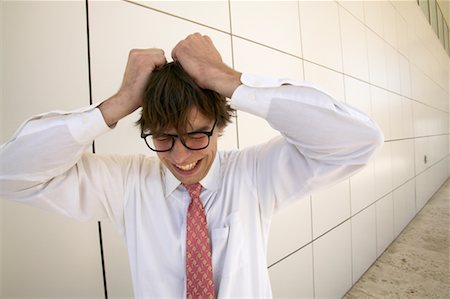 simsearch:700-00088934,k - Portrait of Man Under Stress Stock Photo - Rights-Managed, Code: 700-00546210