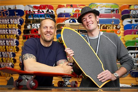 simsearch:700-06407782,k - Two Men with Skateboards in Store Stock Photo - Rights-Managed, Code: 700-00546725