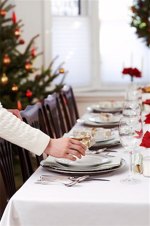 simsearch:600-01838225,k - Woman Setting Table for Christmas Dinner Stock Photo - Rights-Managed, Code: 700-00547135