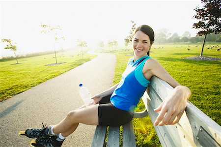 Woman Resting on Park Bench Stock Photo - Rights-Managed, Code: 700-00549468