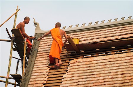 simsearch:700-00049076,k - Buddhist Monks Repairing Roof Of Wat Choum Khong, Luang Prabang, Laos Stock Photo - Rights-Managed, Code: 700-00549488