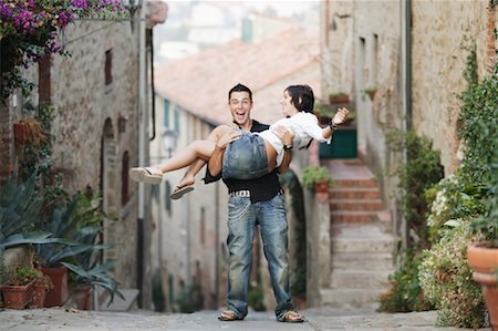 Couple in Street, Castiglione della Pescaia, Tuscany Stock Photo - Rights-Managed, Code: 700-00549627