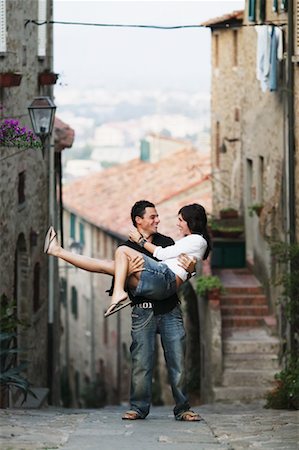 Couple in Street, Castiglione della Pescaia, Tuscany Stock Photo - Rights-Managed, Code: 700-00549629