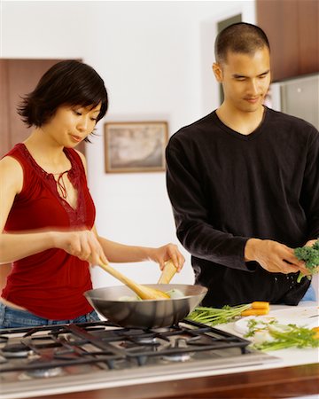 simsearch:400-05740111,k - Couple Cooking Together Stock Photo - Rights-Managed, Code: 700-00543994