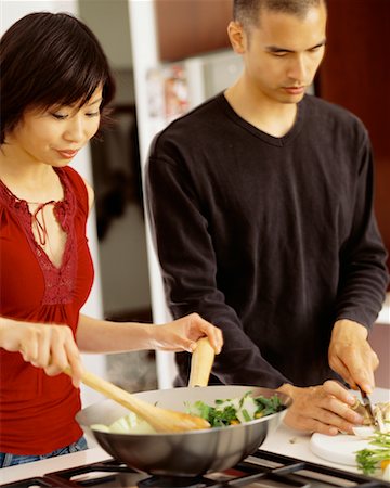 simsearch:400-05740111,k - Couple Cooking Together Stock Photo - Rights-Managed, Code: 700-00543995
