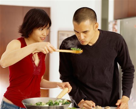 simsearch:400-05740111,k - Couple Cooking Together Stock Photo - Rights-Managed, Code: 700-00543996