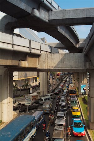 Traffic Under the BTS Skytrain Rails, Bangkok, Thailand Stock Photo - Rights-Managed, Code: 700-00554330
