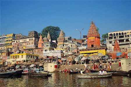 people bathing ganges india - Boats on River with Crowd on Riverbank, Uttar Pradesh, Varanasi, India Stock Photo - Rights-Managed, Code: 700-00554561