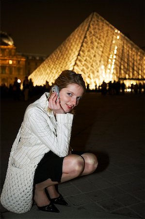 simsearch:700-00189516,k - Woman with Cellular Phone by Louvre, Paris, France Stock Photo - Rights-Managed, Code: 700-00554984