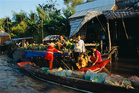 Market Boat by Dock, Phung Hiep, Vietnam Stock Photo - Rights-Managed, Code: 700-00555651