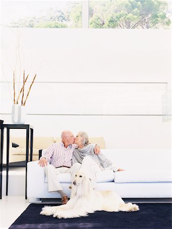 simsearch:700-00194002,k - Couple Kissing in Living Room Stock Photo - Rights-Managed, Code: 700-00557016