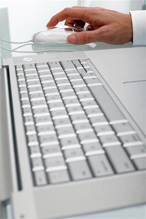 simsearch:700-00641415,k - Hand Using Laptop Computer Mouse Stock Photo - Rights-Managed, Code: 700-00557227