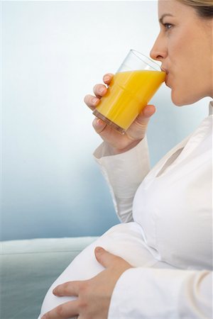 simsearch:400-04398921,k - Pregnant Woman Drinking Orange Juice Stock Photo - Rights-Managed, Code: 700-00557280
