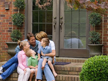 simsearch:700-00514116,k - Family Sitting Outdoors Stock Photo - Rights-Managed, Code: 700-00557517