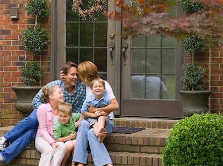 simsearch:700-00514116,k - Family Sitting Outdoors Stock Photo - Rights-Managed, Code: 700-00557519