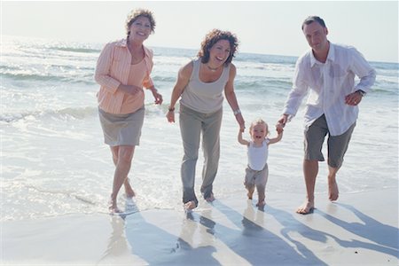simsearch:700-01582158,k - Multigenerational Family Playing On the Beach Stock Photo - Rights-Managed, Code: 700-00557571