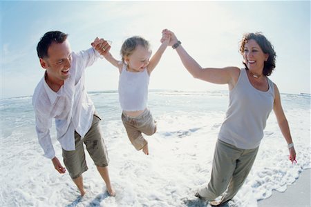 simsearch:700-01582158,k - Family Playing In The Surf Stock Photo - Rights-Managed, Code: 700-00557572