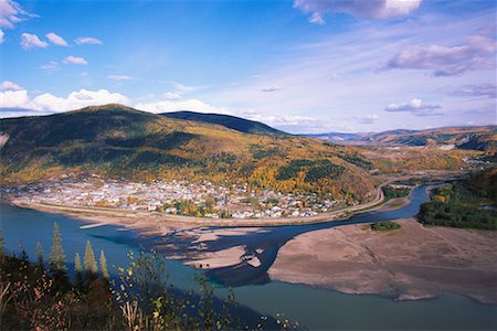 f lukasseck - Overview of City by River, Dawson City, Yukon River, Yukon, Canada Stock Photo - Rights-Managed, Code: 700-00557639