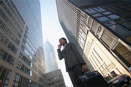 Businesswoman Talking on Cellular Phone, Toronto, Ontario, Canada Stock Photo - Rights-Managed, Code: 700-00550054