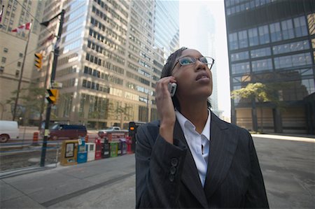 simsearch:700-00163379,k - Businesswoman Talking on Cellular Phone, Toronto, Ontario, Canada Stock Photo - Rights-Managed, Code: 700-00550051