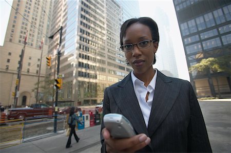 Businesswoman With Cellular Phone, Toronto, Ontario, Canada Stock Photo - Rights-Managed, Code: 700-00550052