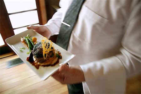simsearch:649-06352937,k - Waiter Serving a Bison Steak Dish Stock Photo - Rights-Managed, Code: 700-00550305
