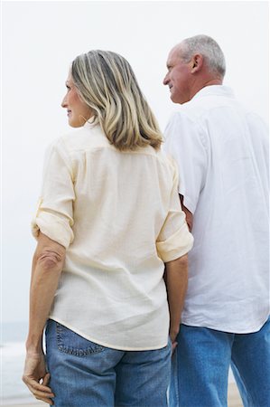simsearch:600-06701932,k - Back View of Couple Outdoors Stock Photo - Rights-Managed, Code: 700-00550335