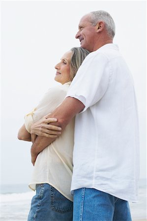 simsearch:600-06701932,k - Couple Standing at Beach Stock Photo - Rights-Managed, Code: 700-00550336