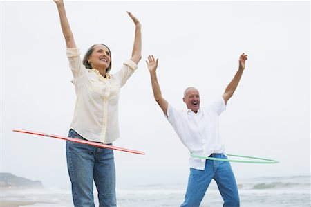 simsearch:700-00190697,k - Couple Hula-Hooping Stock Photo - Rights-Managed, Code: 700-00550337