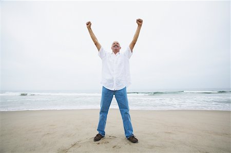 simsearch:700-00190697,k - Man Cheering on the Beach Stock Photo - Rights-Managed, Code: 700-00550357
