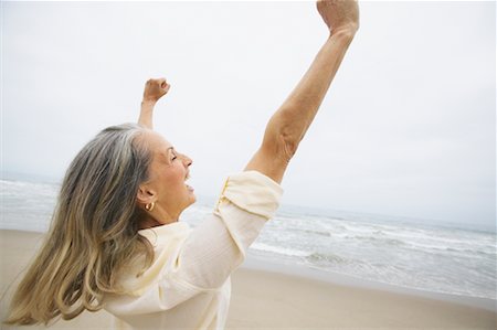 simsearch:700-00377960,k - Woman Cheering at Beach Stock Photo - Rights-Managed, Code: 700-00550377