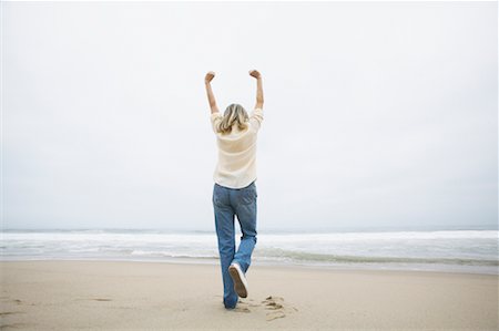 simsearch:700-00377960,k - Woman Cheering at Beach Stock Photo - Rights-Managed, Code: 700-00550378