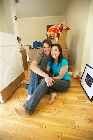 simsearch:600-01073479,k - Couple Sitting On Hallway Floor On Moving Day Stock Photo - Rights-Managed, Code: 700-00550545