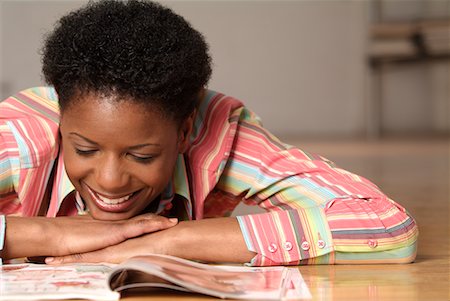 simsearch:700-00606802,k - Woman Reading Magazine Stock Photo - Rights-Managed, Code: 700-00550657