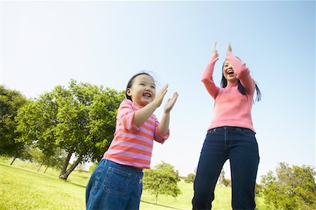 simsearch:700-00377960,k - Mother and Daughter Clapping Hands Stock Photo - Rights-Managed, Code: 700-00550889