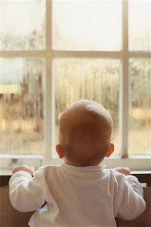 Baby Looking Out the Window Stock Photo - Rights-Managed, Code: 700-00551368