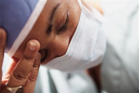 distressed female physician - Doctor Looking Upset Stock Photo - Rights-Managed, Code: 700-00560480