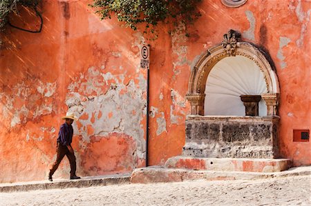 Man Walking on Street, San Miguel de Allende, Guanajuato, Mexico Stock Photo - Rights-Managed, Code: 700-00560807