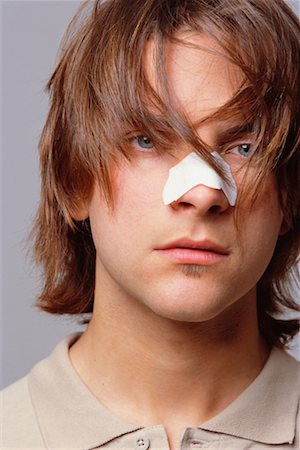 simsearch:700-00561804,k - Man Using Acne Strip Stock Photo - Rights-Managed, Code: 700-00561798