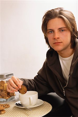 simsearch:700-00561804,k - Portrait of Young Man Having Coffee and Cookies Stock Photo - Rights-Managed, Code: 700-00561807