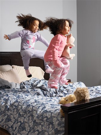 simsearch:700-00519358,k - Two Girls Jumping on Bed Stock Photo - Rights-Managed, Code: 700-00588940