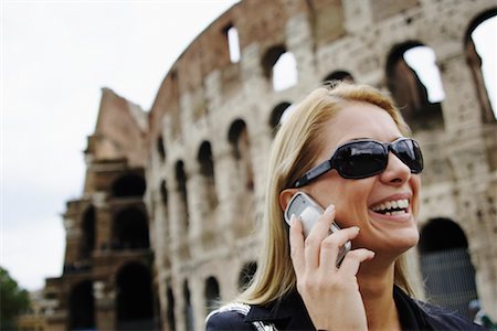 simsearch:700-00189516,k - Woman with Cellular Phone by Colosseum, Rome, Italy Stock Photo - Rights-Managed, Code: 700-00591464