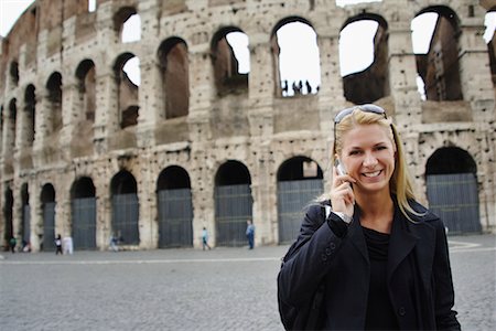 simsearch:700-00189516,k - Woman with Cellular Phone by Colosseum, Rome, Italy Stock Photo - Rights-Managed, Code: 700-00591463